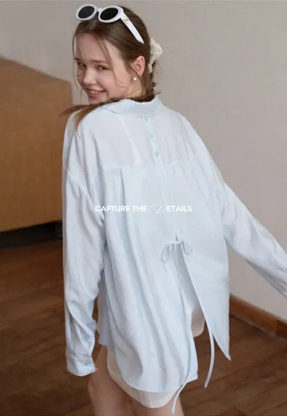 Oversized shirt with back tie detail and button placket