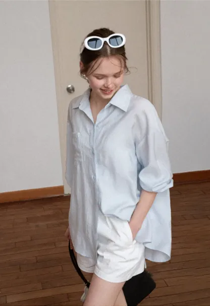 Oversized shirt with back tie detail and button placket