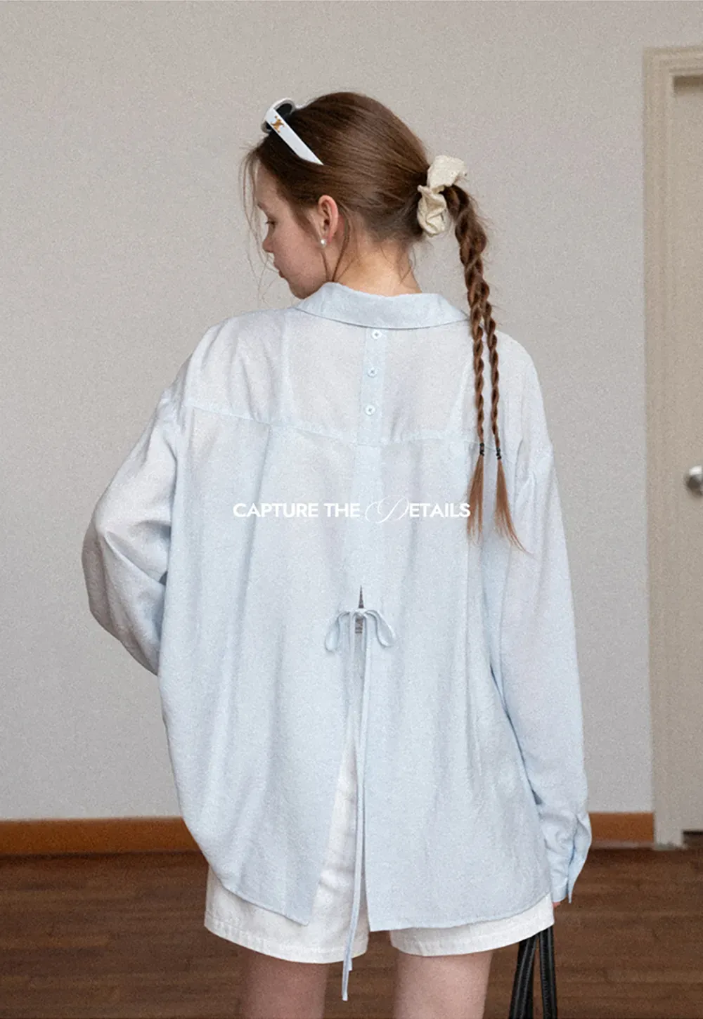 Oversized shirt with back tie detail and button placket