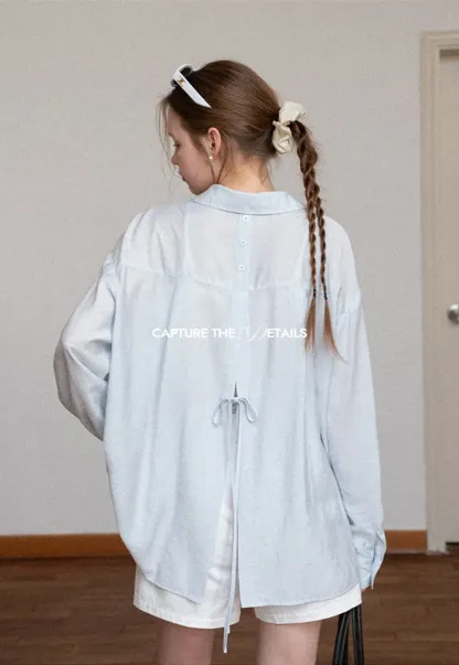 Oversized shirt with back tie detail and button placket