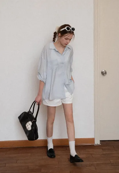 Oversized shirt with back tie detail and button placket