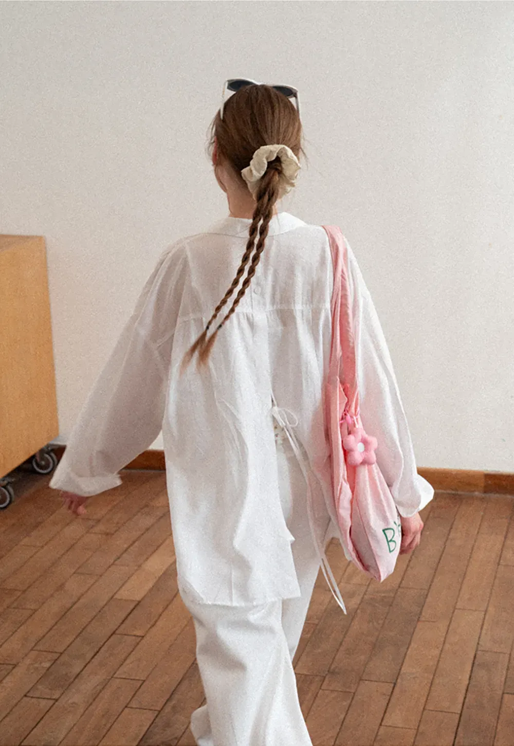 Oversized shirt with back tie detail and button placket