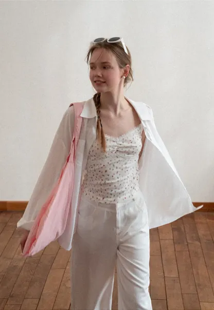 Oversized shirt with back tie detail and button placket