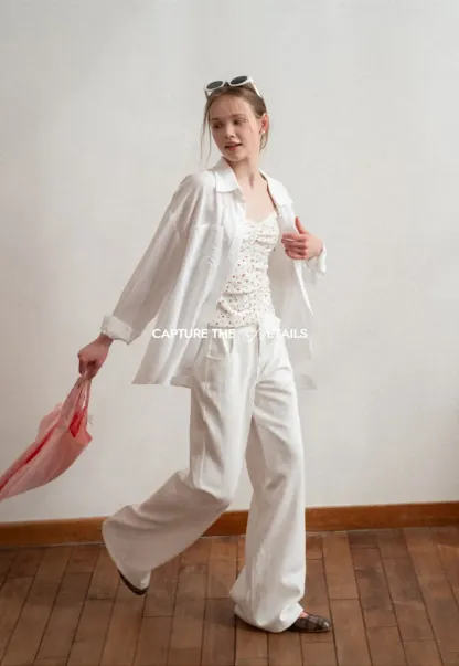 Oversized shirt with back tie detail and button placket