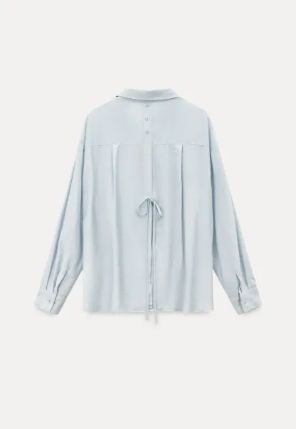 Oversized shirt with back tie detail and button placket