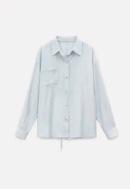 Oversized shirt with back tie detail and button placket