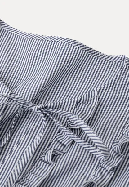 Striped short sleeve shirt with ruffles and tie front