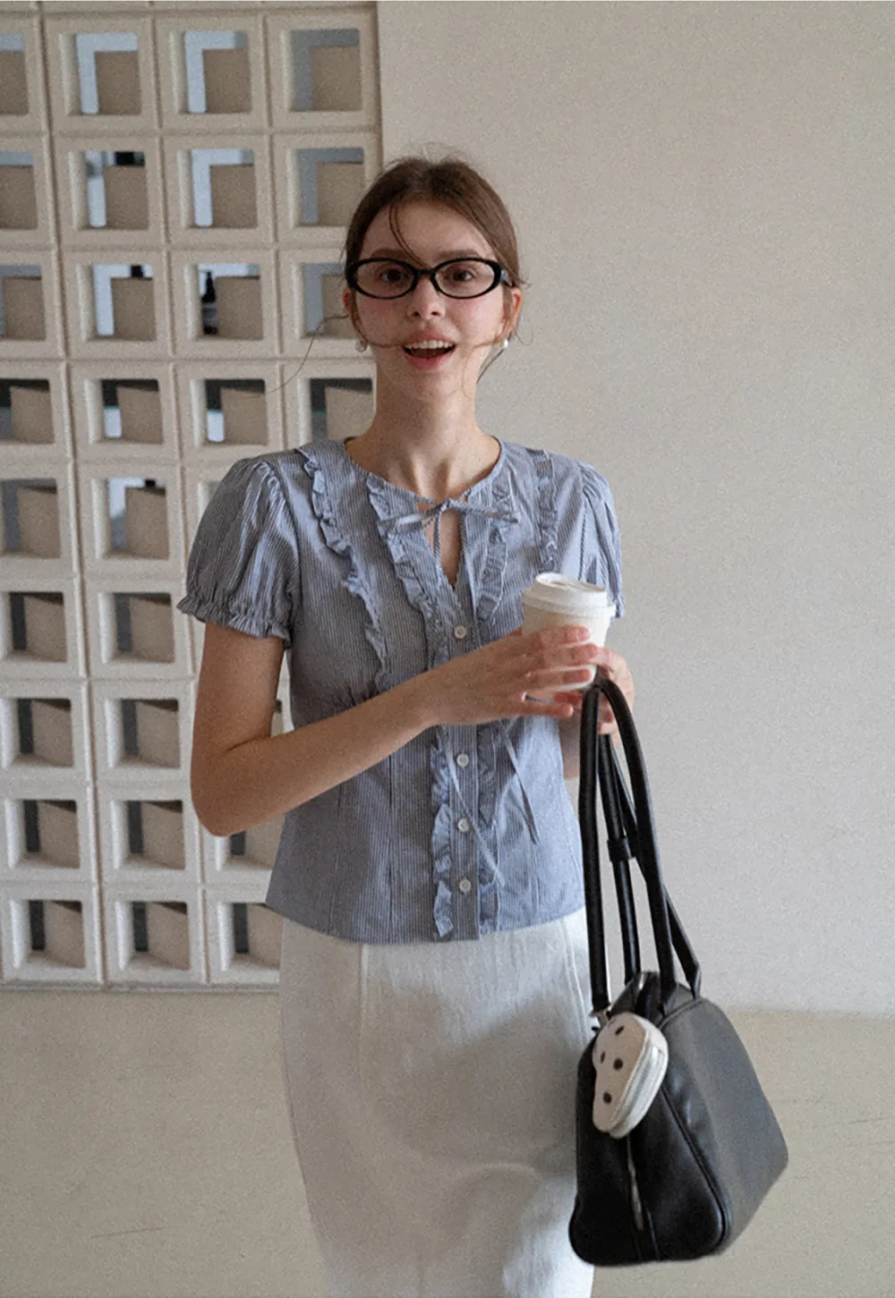 Striped short sleeve shirt with ruffles and tie front