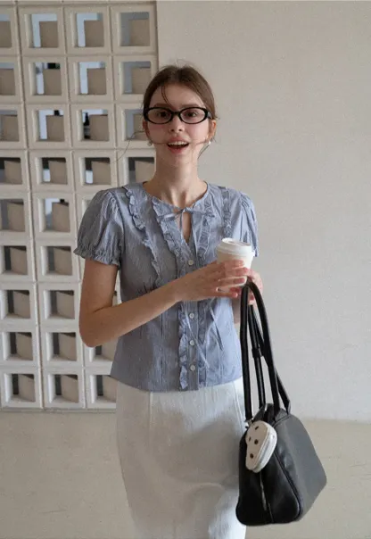 Striped short sleeve shirt with ruffles and tie front