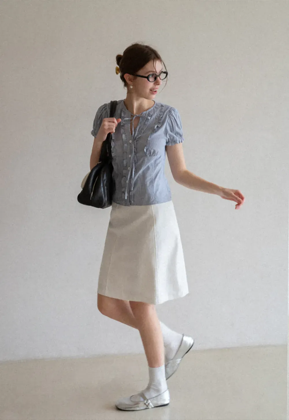 Striped short sleeve shirt with ruffles and tie front