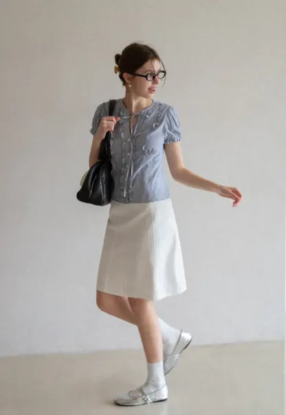 Striped short sleeve shirt with ruffles and tie front