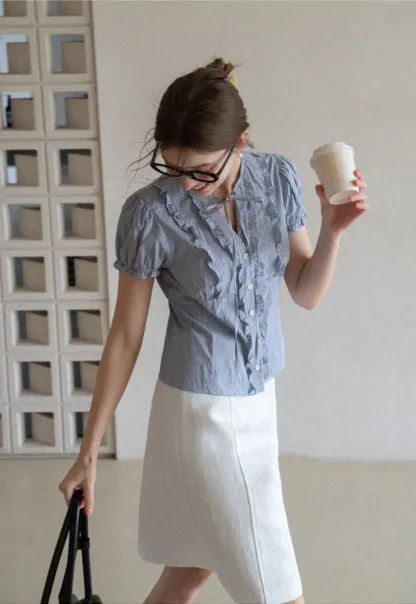 Striped short sleeve shirt with ruffles and tie front