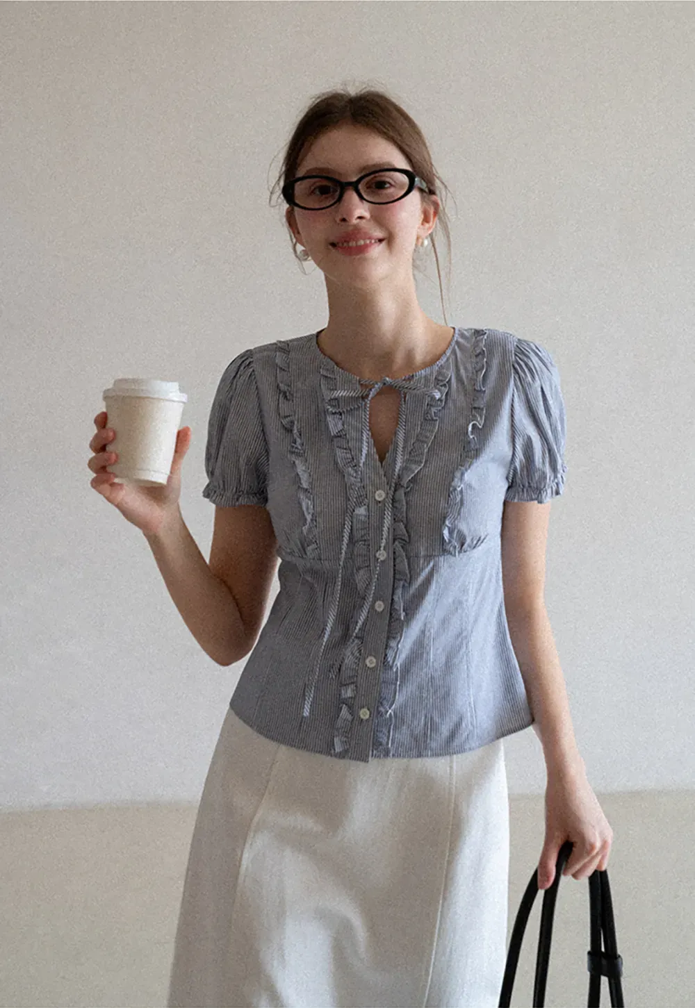 Striped short sleeve shirt with ruffles and tie front