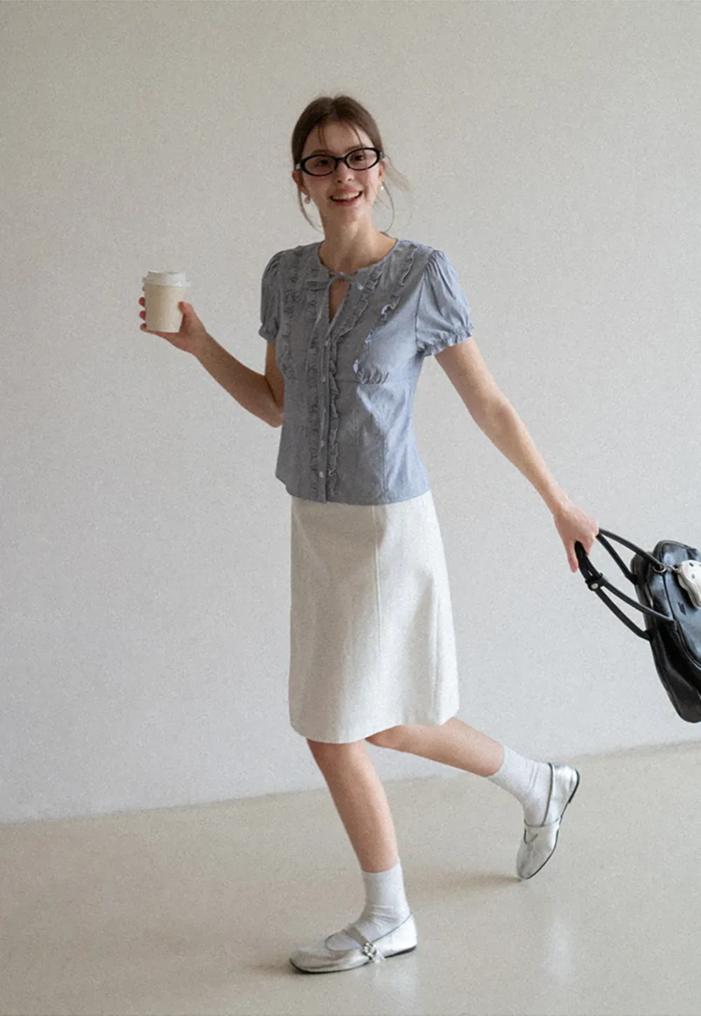 Striped short sleeve shirt with ruffles and tie front