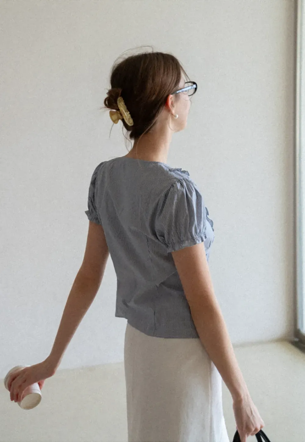 Striped short sleeve shirt with ruffles and tie front