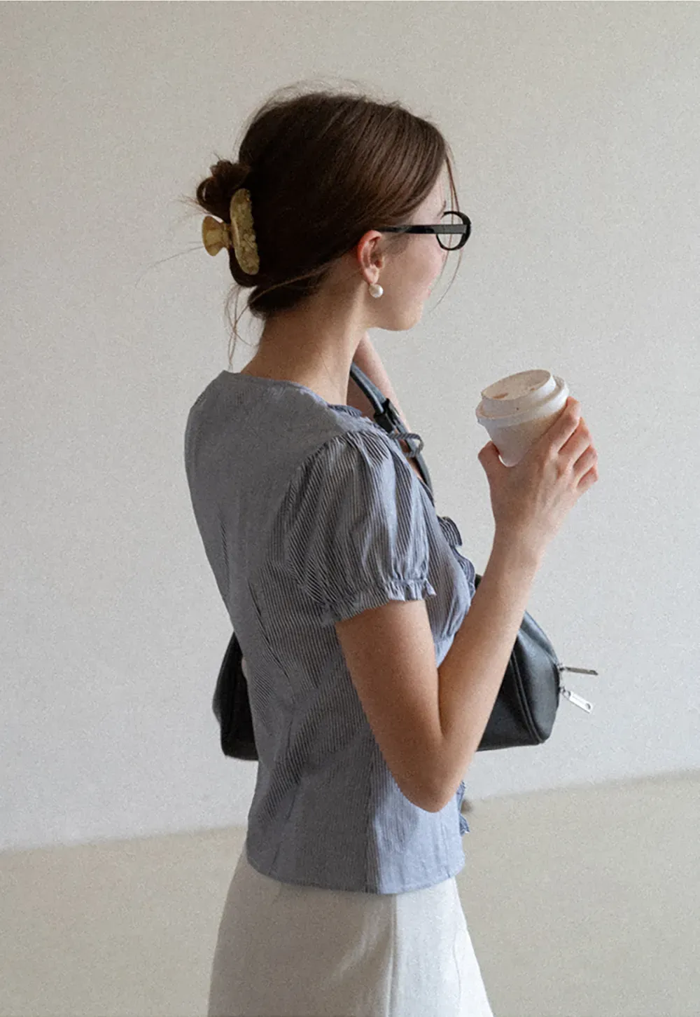Striped short sleeve shirt with ruffles and tie front