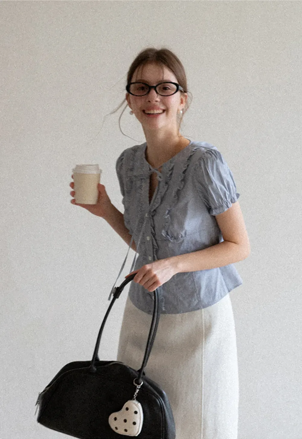 Striped short sleeve shirt with ruffles and tie front