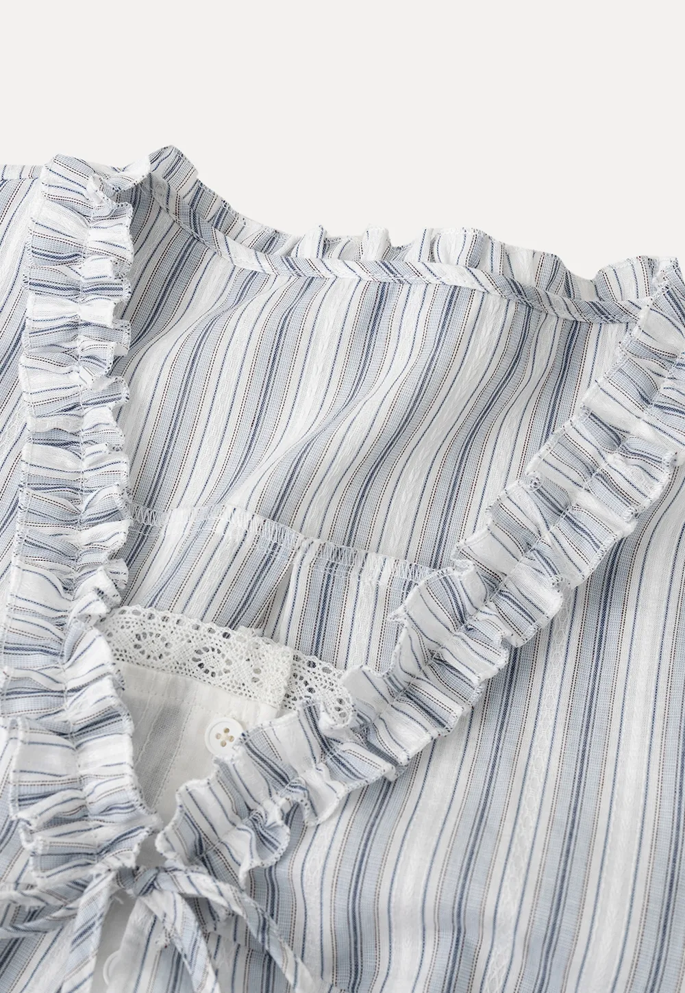 Striped short sleeve blouse with ruffled V neck