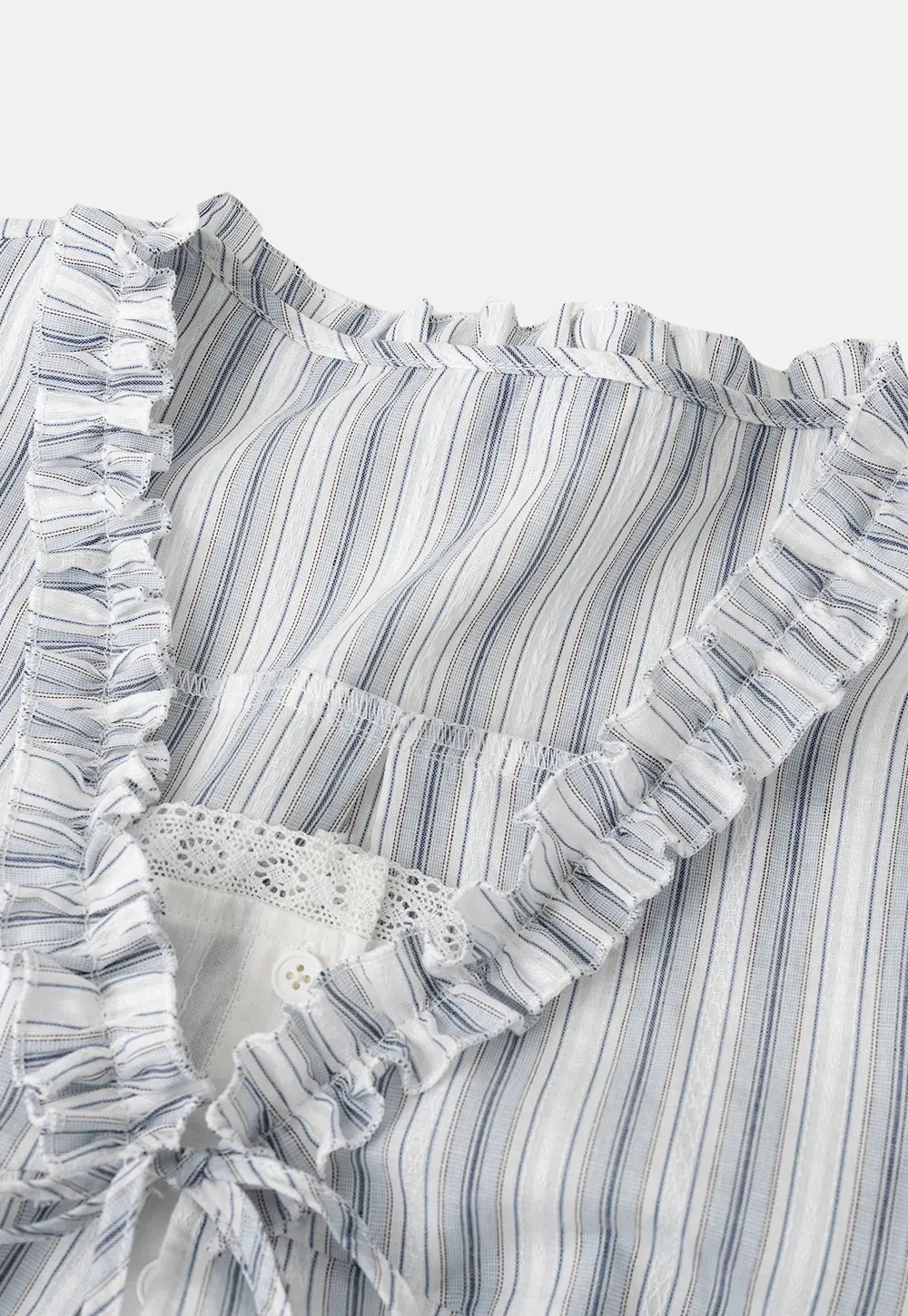 Striped short sleeve blouse with ruffled V neck