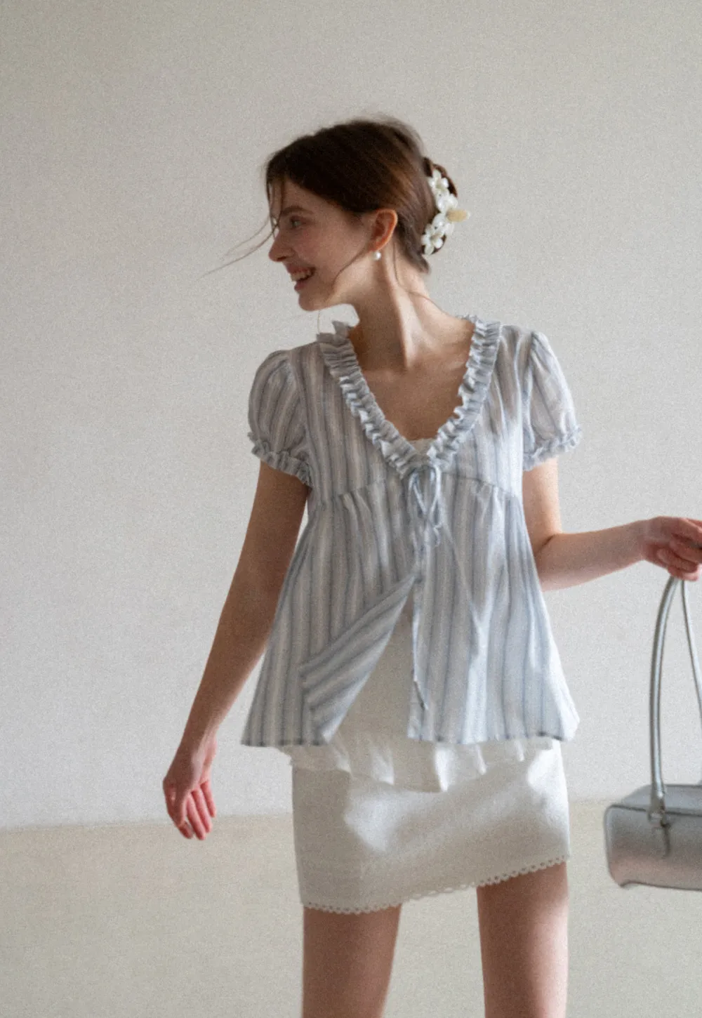Striped short sleeve blouse with ruffled V neck