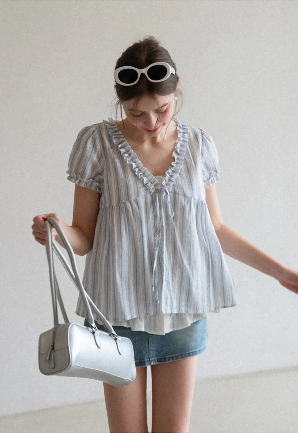 Striped short sleeve blouse with ruffled V neck