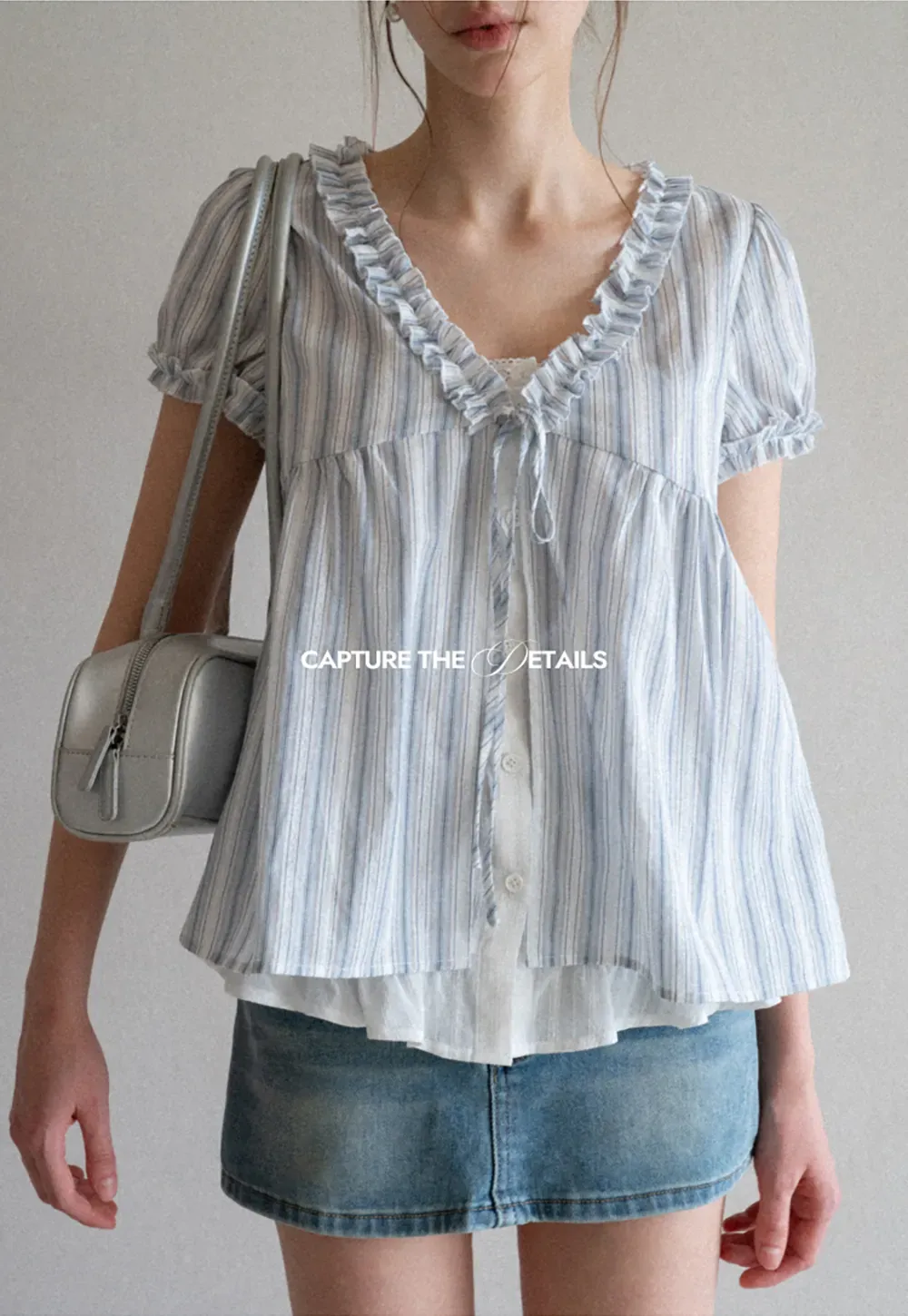 Striped short sleeve blouse with ruffled V neck