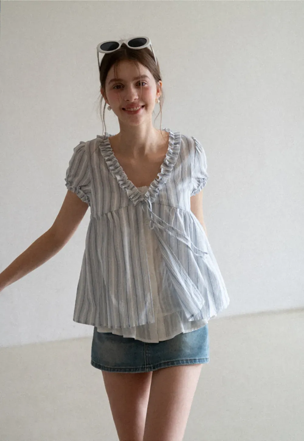 Striped short sleeve blouse with ruffled V neck
