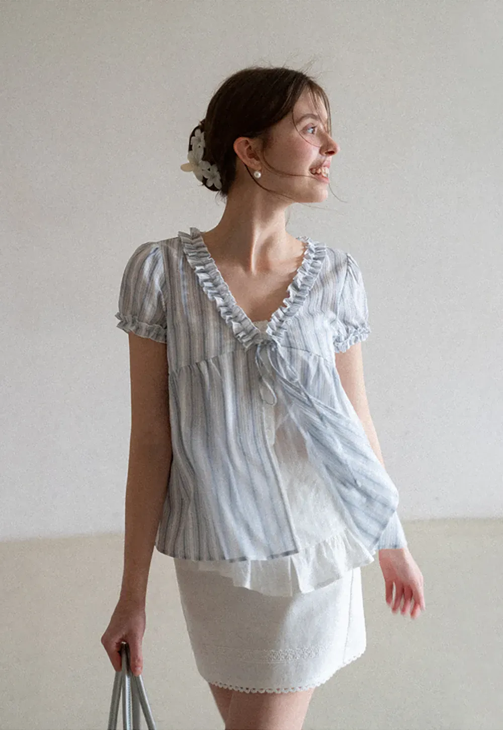 Striped short sleeve blouse with ruffled V neck