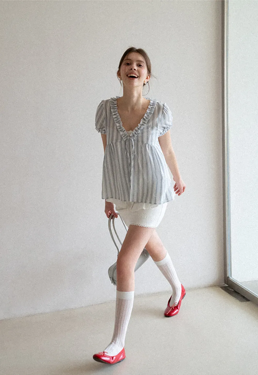 Striped short sleeve blouse with ruffled V neck