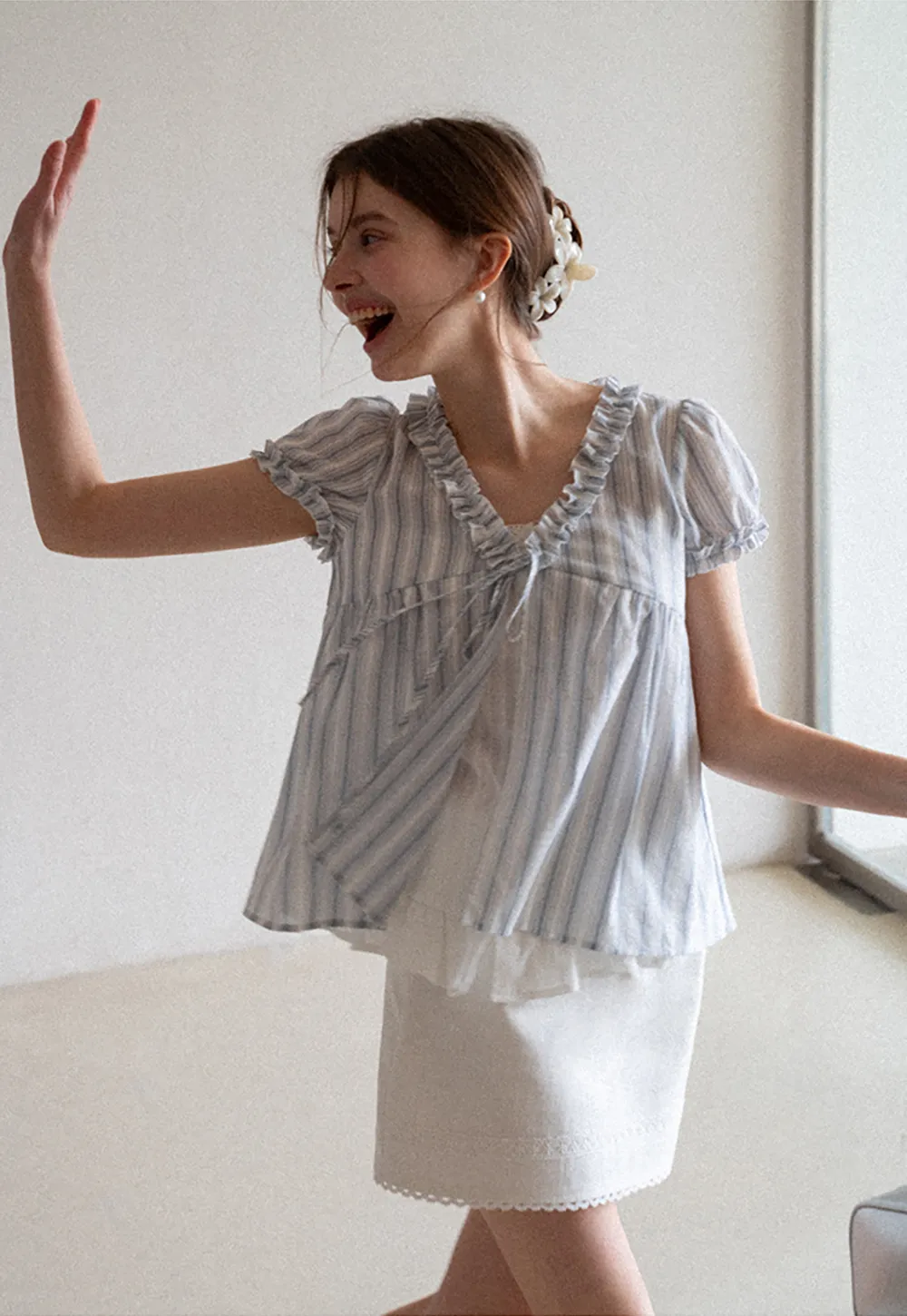 Striped short sleeve blouse with ruffled V neck
