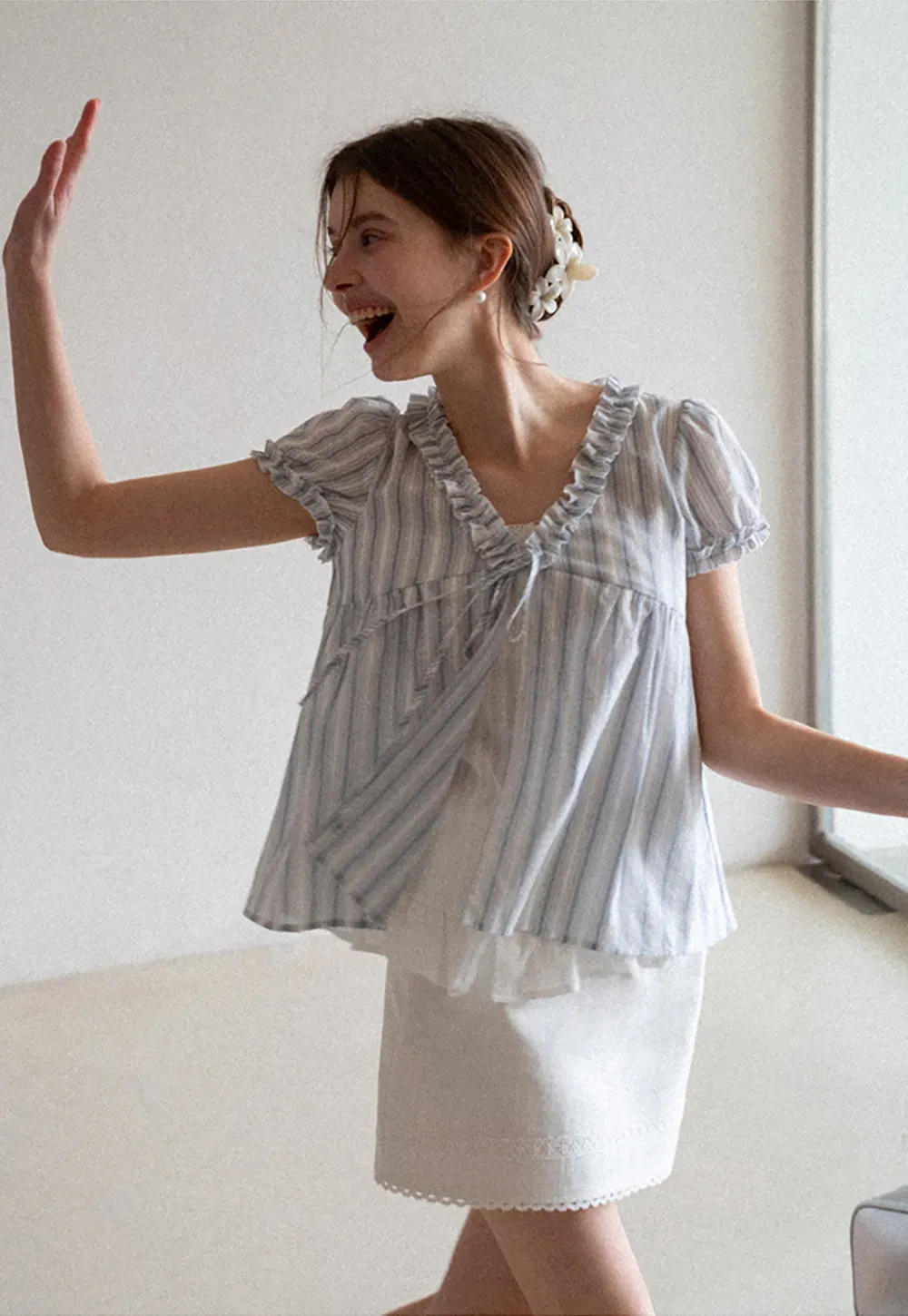 Striped short sleeve blouse with ruffled V neck