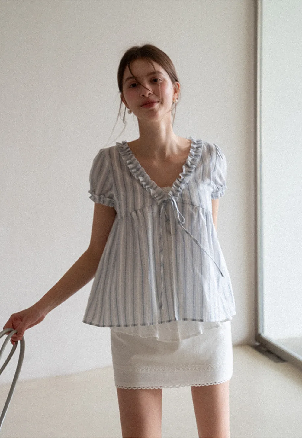 Striped short sleeve blouse with ruffled V neck