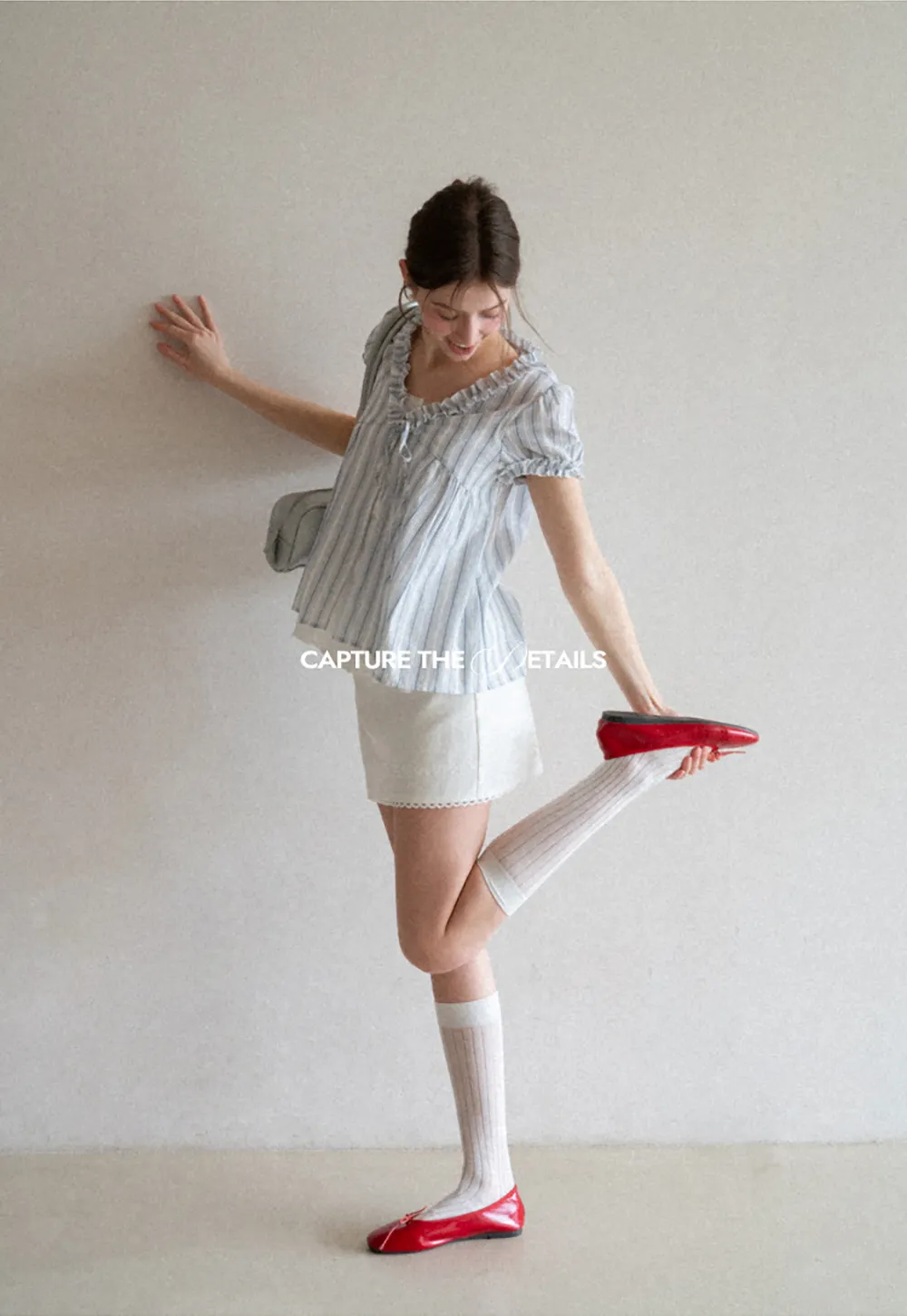 Striped short sleeve blouse with ruffled V neck