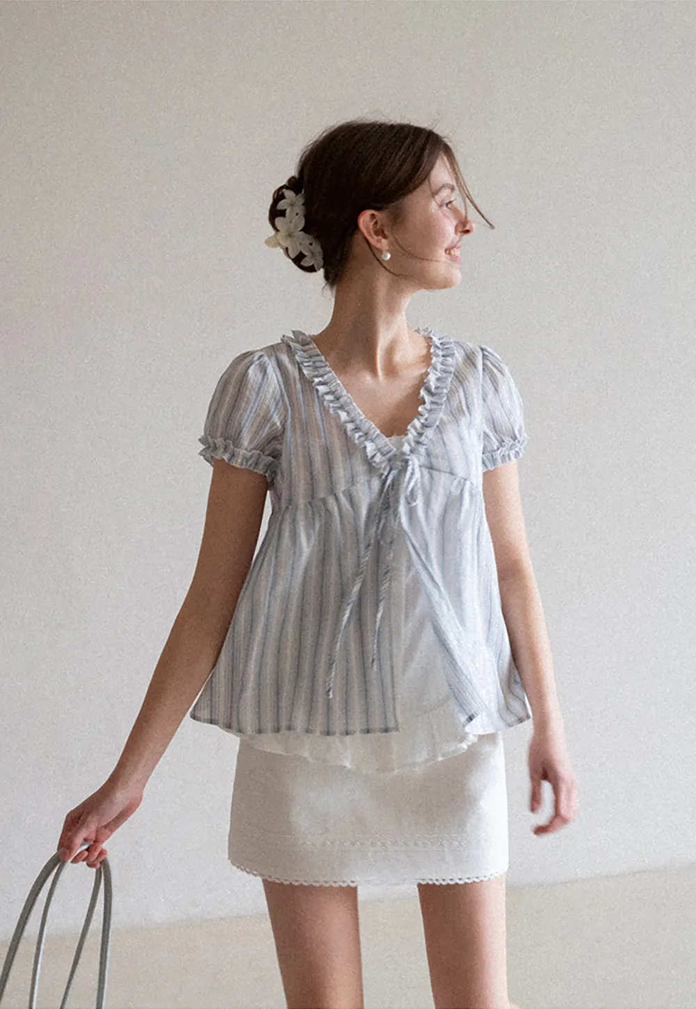 Striped short sleeve blouse with ruffled V neck