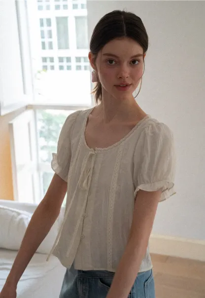 Puff Sleeve Ruffled Hem Shirt