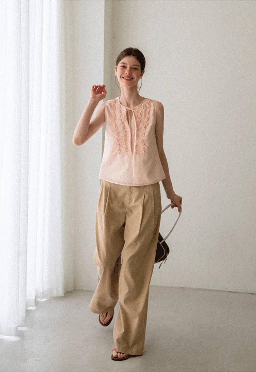 Ruffled Trim Sleeveless Shirt With Tie Neck Detail