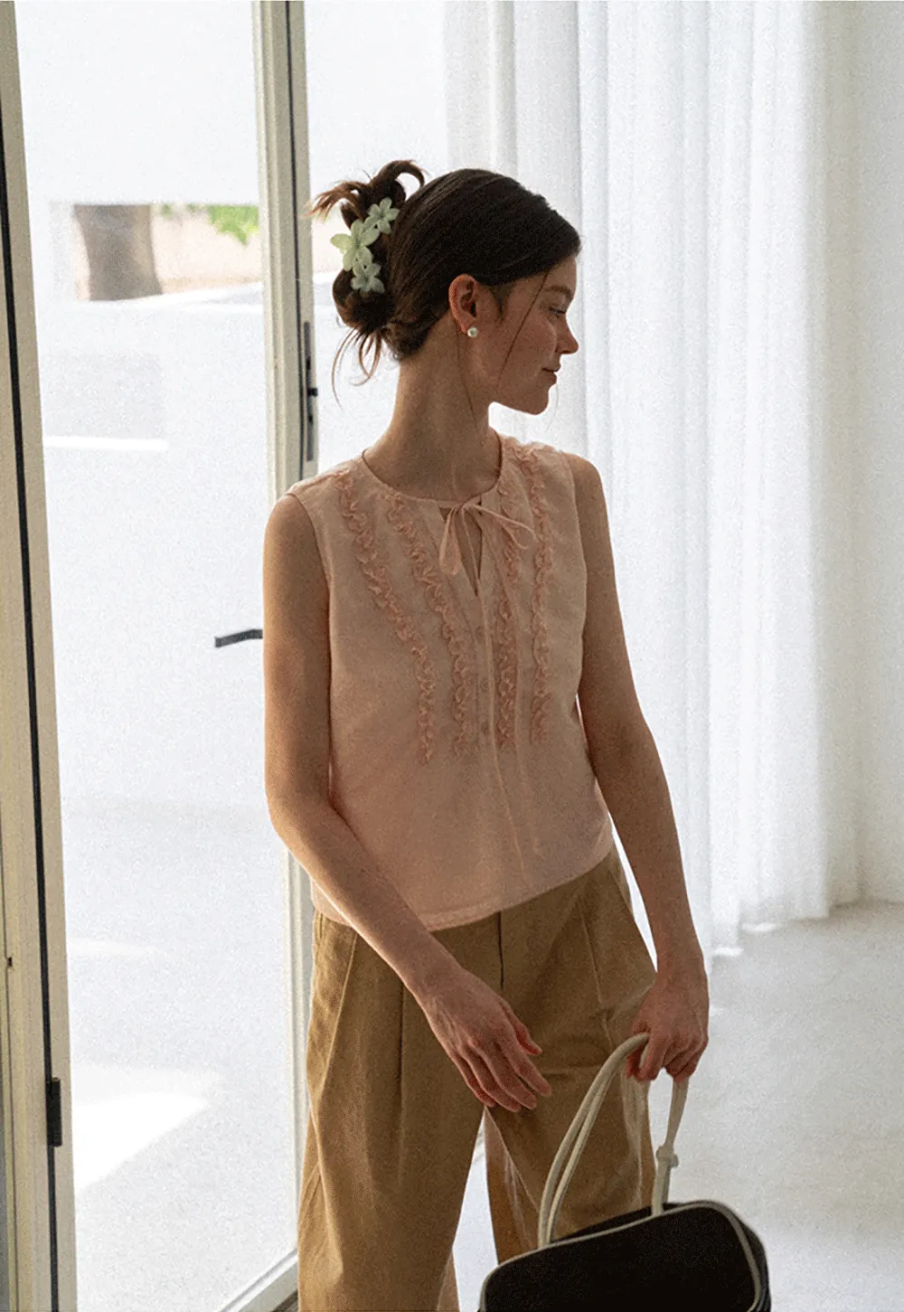 Ruffled Trim Sleeveless Shirt With Tie Neck Detail