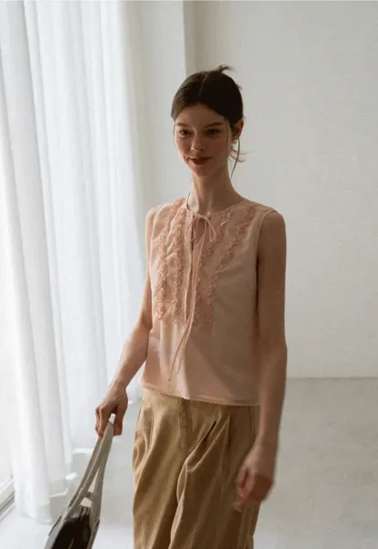 Ruffled Trim Sleeveless Shirt With Tie Neck Detail