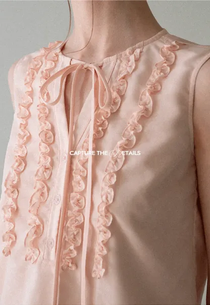 Ruffled Trim Sleeveless Shirt With Tie Neck Detail