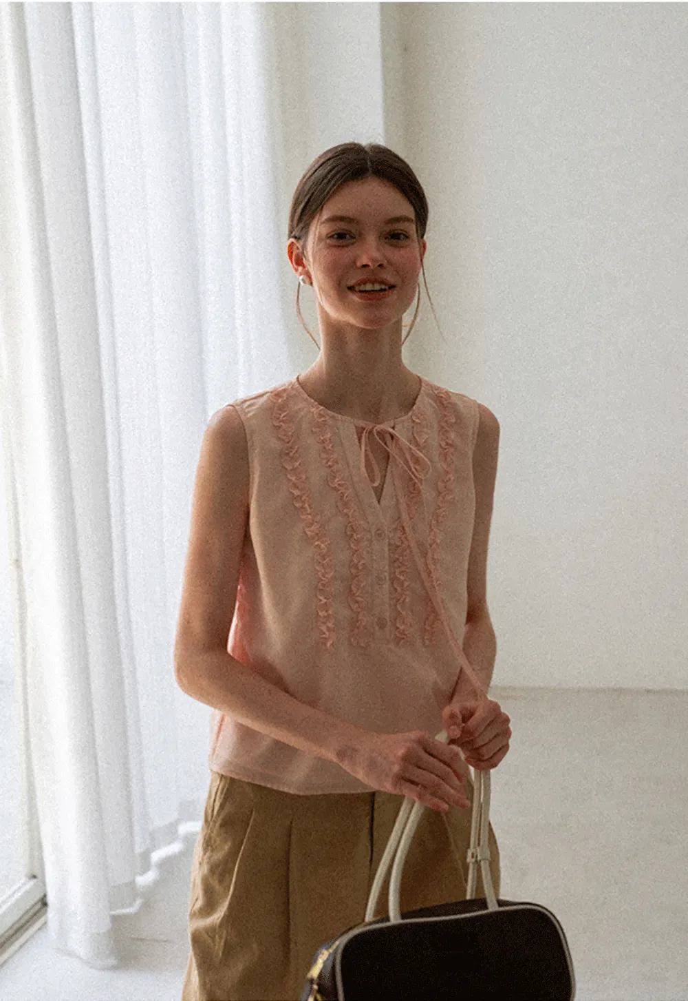 Ruffled Trim Sleeveless Shirt With Tie Neck Detail