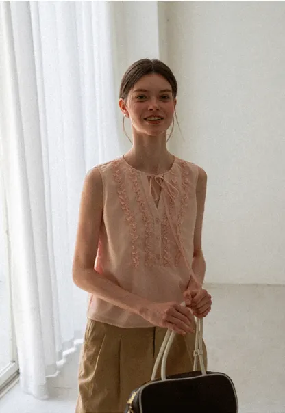 Ruffled Trim Sleeveless Shirt With Tie Neck Detail