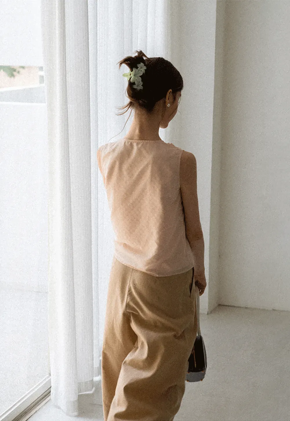 Ruffled Trim Sleeveless Shirt With Tie Neck Detail