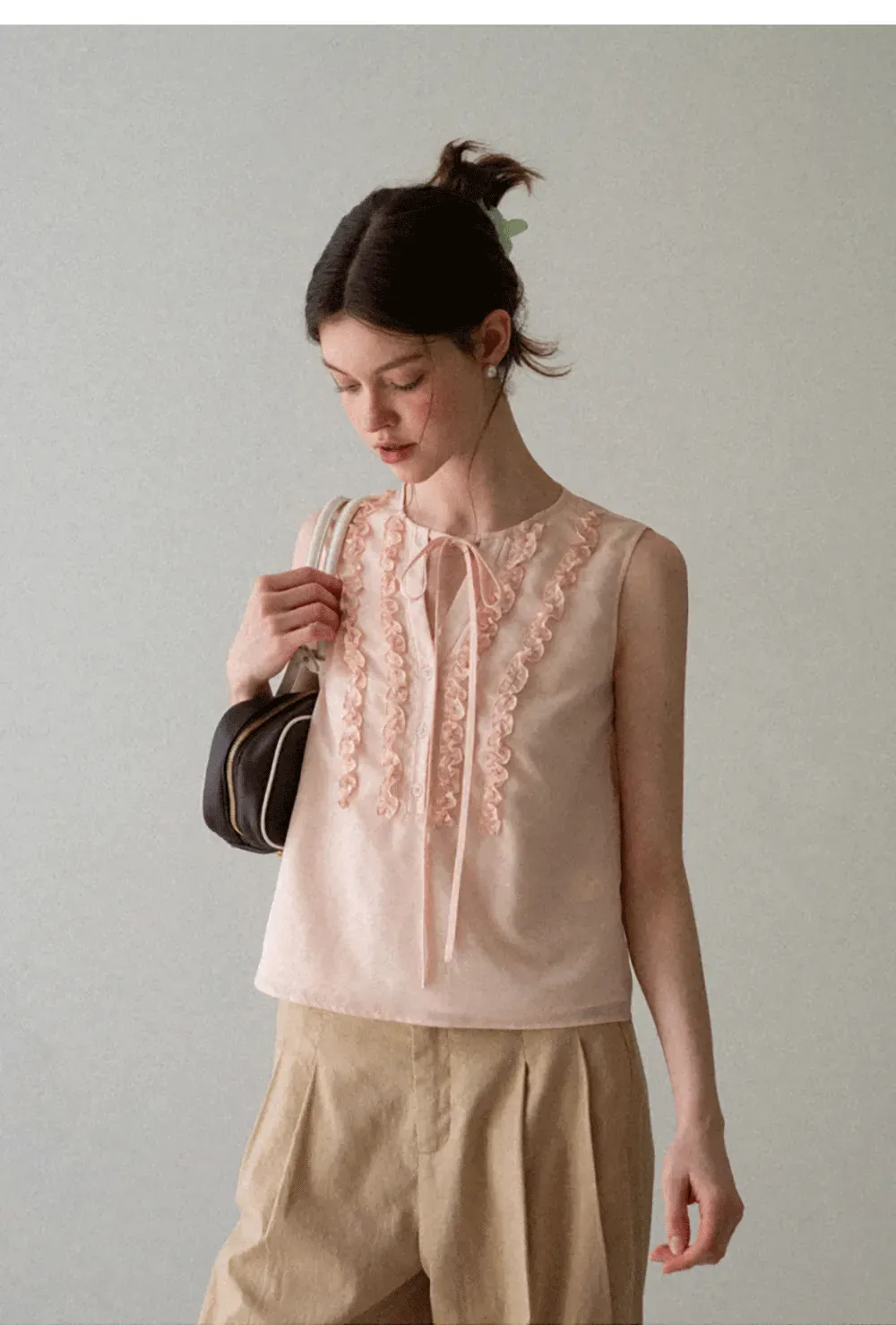 Ruffled Trim Sleeveless Shirt With Tie Neck Detail