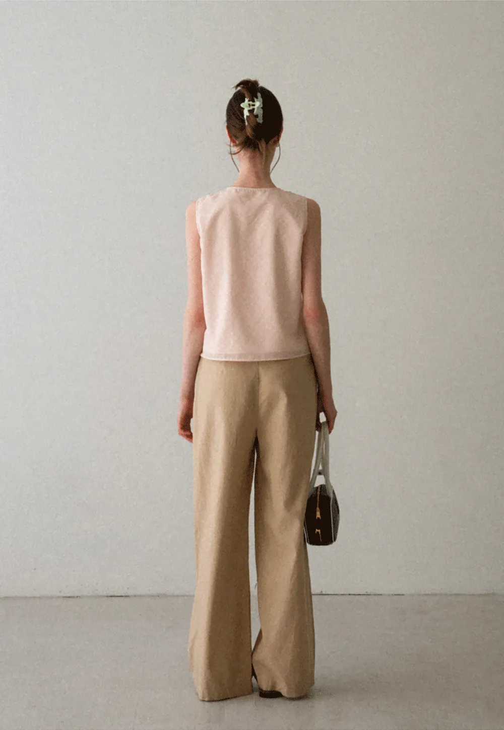 Ruffled Trim Sleeveless Shirt With Tie Neck Detail