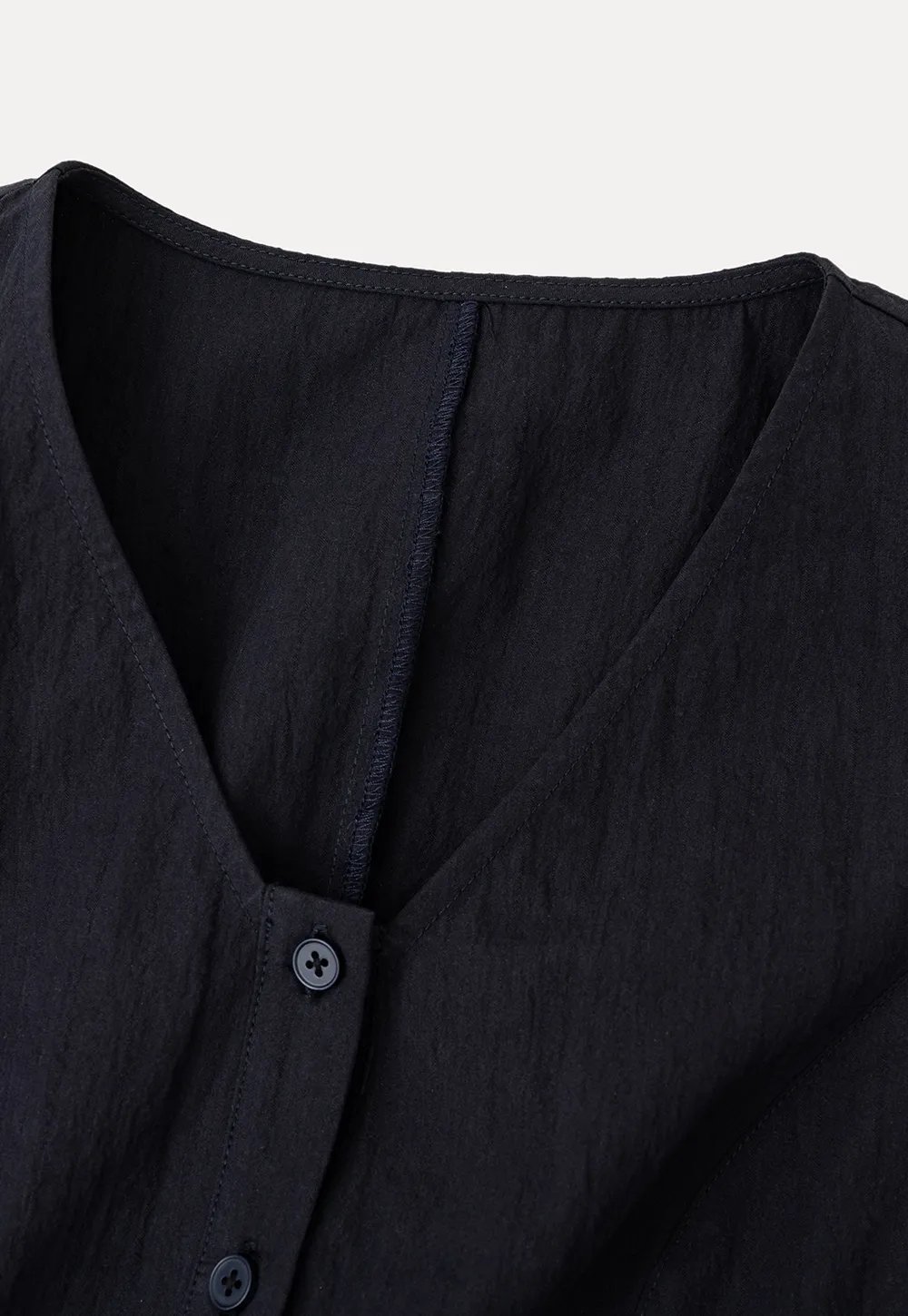 V Neck Sleeveless Peplum Shirt