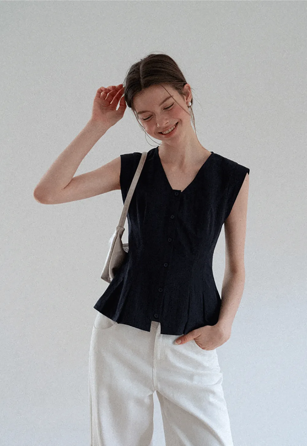 V Neck Sleeveless Peplum Shirt