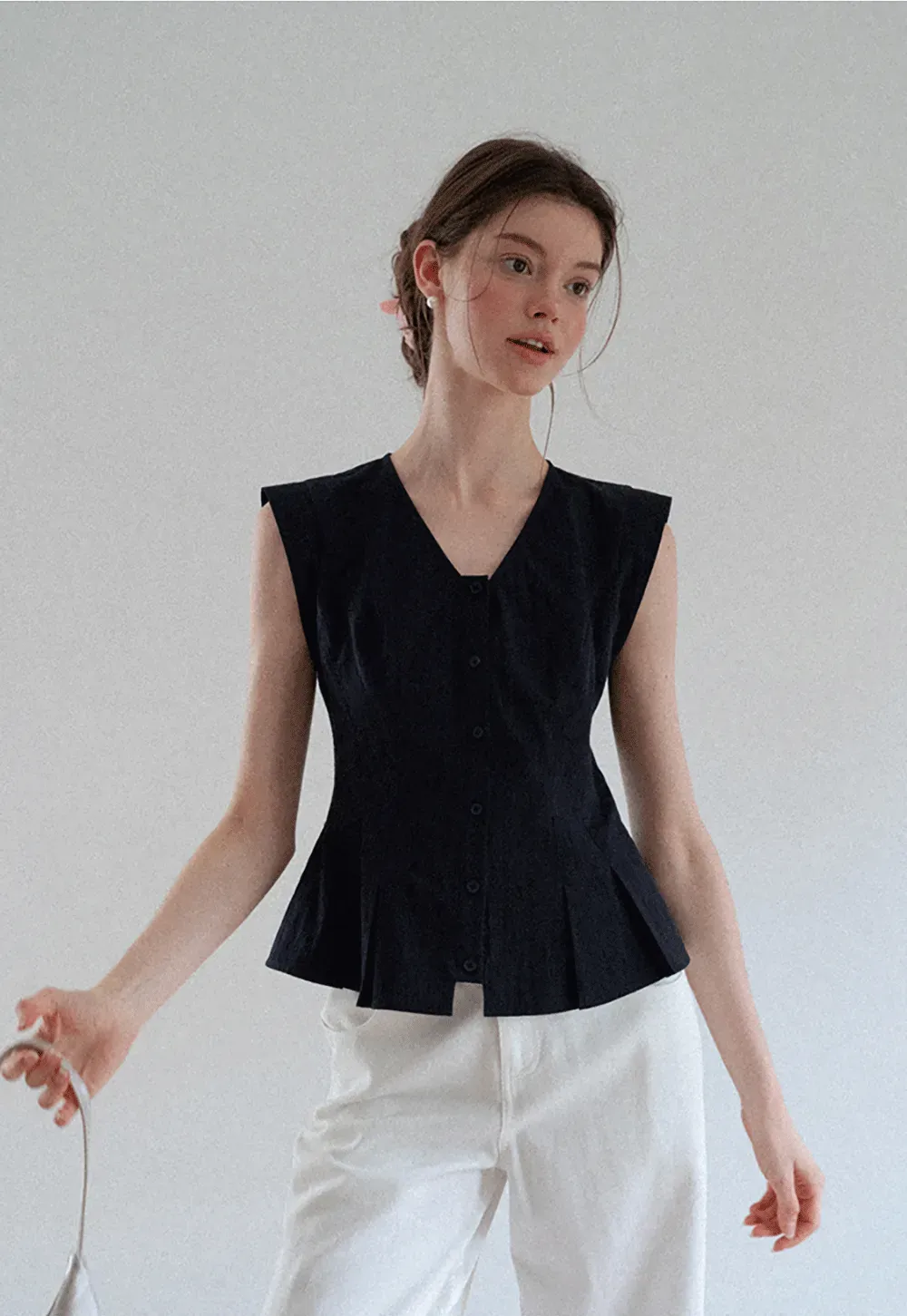 V Neck Sleeveless Peplum Shirt