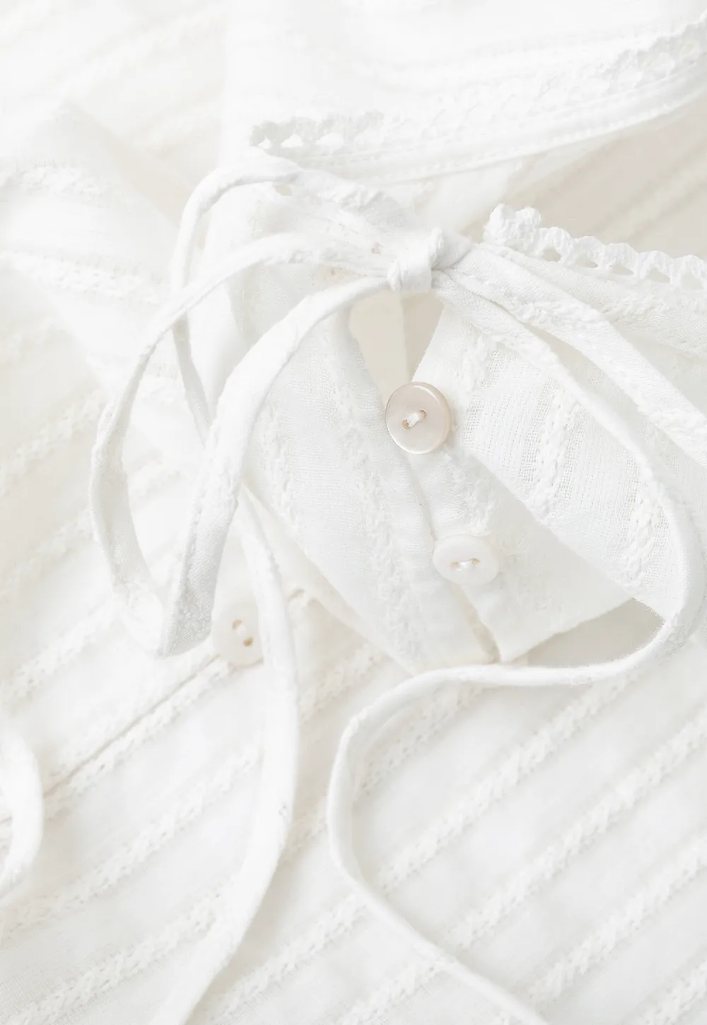 Pleated Short Sleeve Blouse with Ruffled Neckline