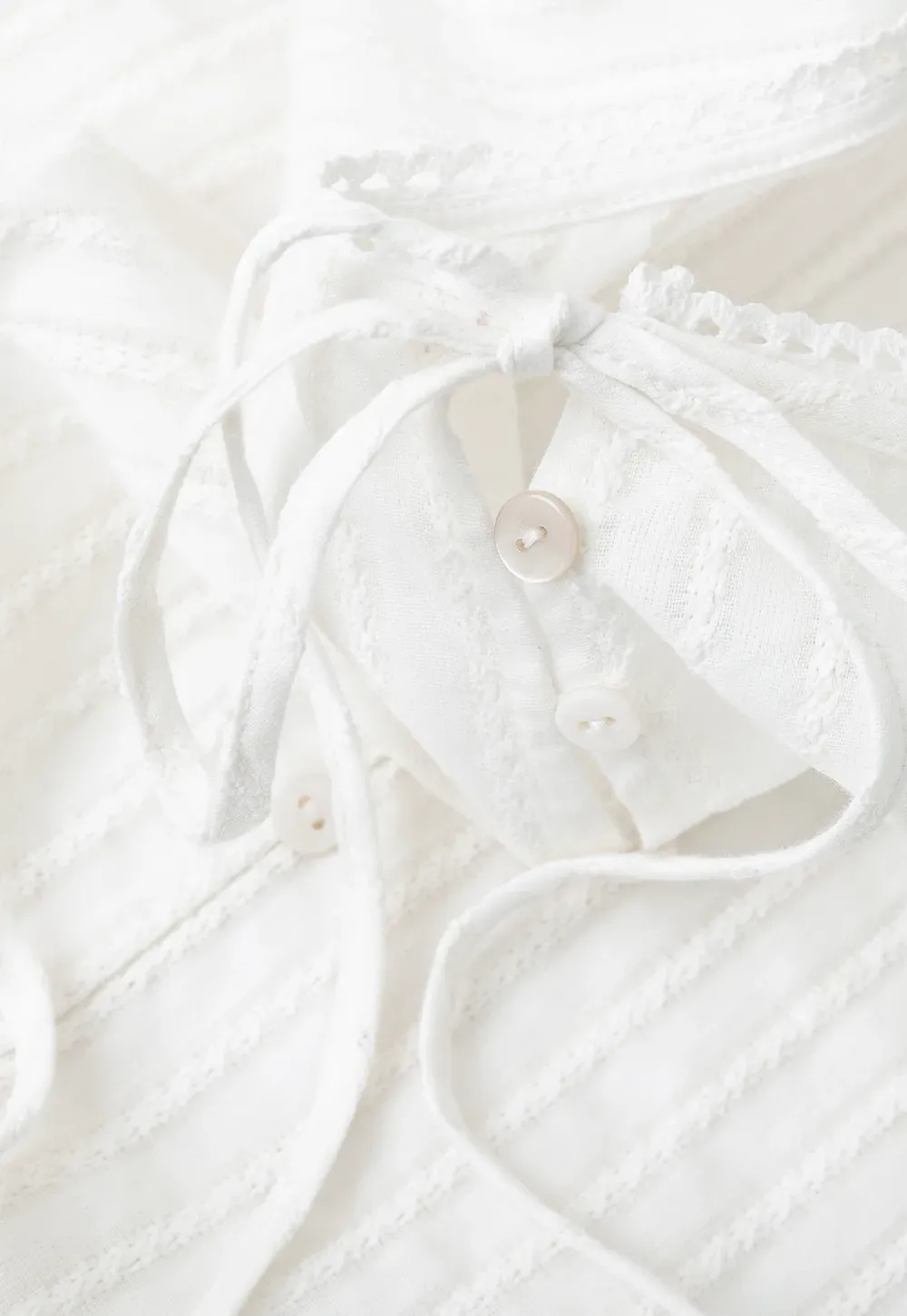 Pleated Short Sleeve Blouse with Ruffled Neckline