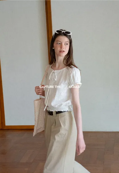 Pleated Short Sleeve Blouse with Ruffled Neckline